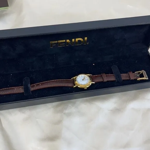 Vintage Fendi brown strap small gold face watch