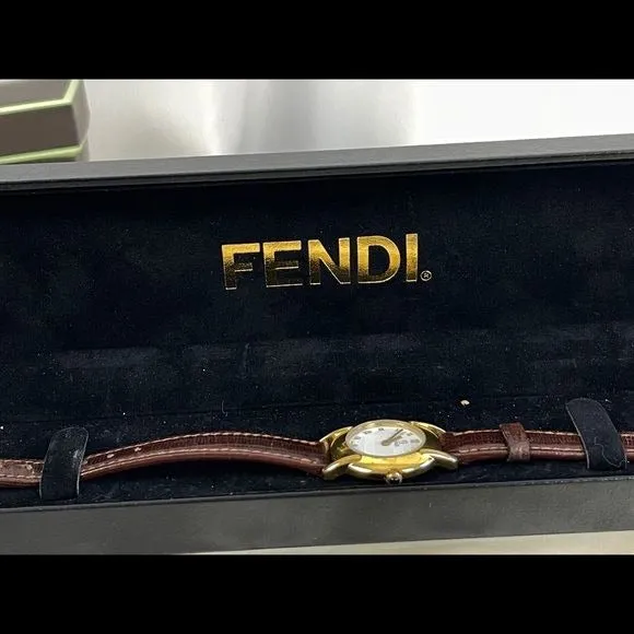 Vintage Fendi brown strap small gold face watch